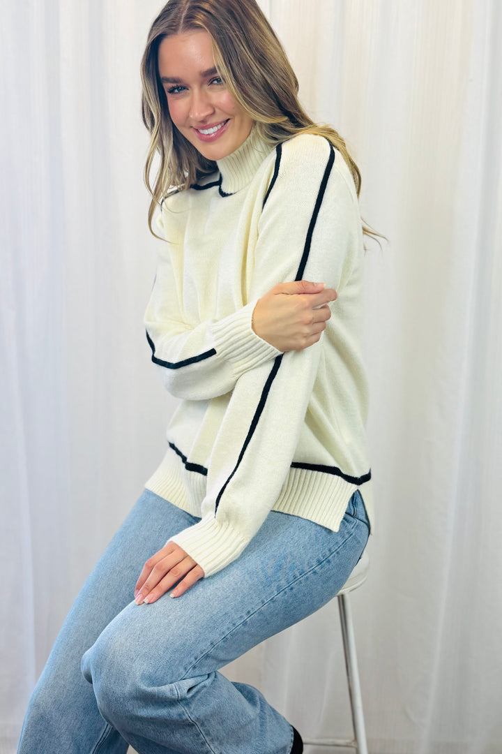 Angie High Neck Knit in Cream With Black Detail