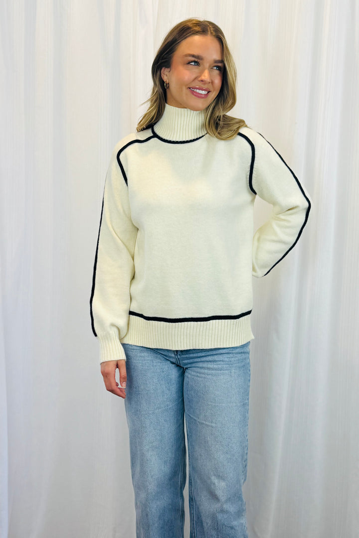Angie High Neck Knit in Cream With Black Detail